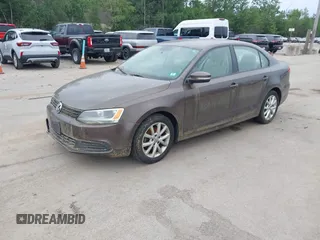 2012 Volkswagen Jetta SE z VIN 3VWDP7AJ7CM072695, wystawiony jako IAAI lot #42616264 z przebiegiem 220 296 mil mil oraz . Historia ofert i sprzedaży dostępna na DreamBid. Obrazek 2.
