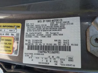 2014 Ford Fusion S with VIN 1FA6P0G79E5360991, listed as a IAAI auction lot 41884597 with 244,786 mi miles and . Bid and sale history available at DreamBid. Image 9.