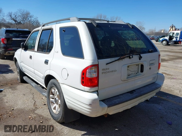 2002 Isuzu Rodeo z VIN 4S2DM58W624304459, wystawiony jako IAAI lot #41853398 z przebiegiem 169 313 mil mil oraz . Historia ofert i sprzedaży dostępna na DreamBid. Obrazek 3.