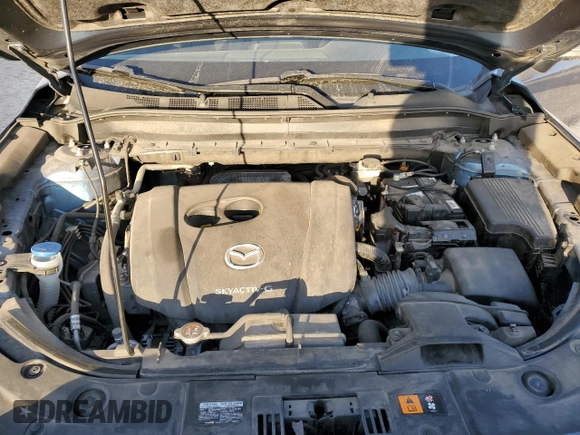 2020 Mazda CX-5 Touring with VIN JM3KFBCM9L0737243, listed as a Copart auction lot 46908495 with 76,956 mi miles and Salvage Title. Bid and sale history available at carsss.com. Image 12.