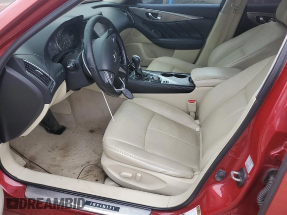 2015 Infiniti Q50 with VIN JN1BV7AR0FM396516, listed as a Copart auction lot 57677055 with 128,369 mi miles and Salvage title. Bid and sale history available at DreamBid. Image 7.