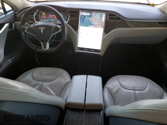 2013 Tesla Model S with VIN 5YJSA1AG5DFP12177, listed as a Copart auction lot 61846195 with 130,668 mi miles and Salvage title. Bid and sale history available at DreamBid. Image 8.