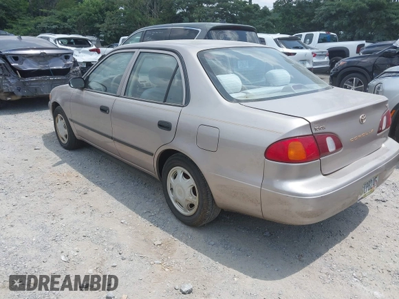1998 Toyota Corolla VE with VIN 1NXBR12E0WZ051301, listed as a IAAI auction lot 42701905 with Not provided miles and . Bid and sale history available at DreamBid. Image 3.