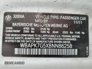 2011 BMW 3 Series 328i xDrive with VIN WBAPK7G5XBNN86258, listed as a Copart auction lot 61224485 with 202,186 mi miles and Salvage title. Bid and sale history available at DreamBid. Image 12.
