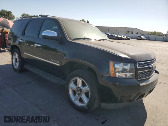 2009 Chevrolet Tahoe LTZ with VIN 1GNFK33089R139455, listed as a Copart auction lot 58953995 with 176,029 mi miles and Salvage title. Bid and sale history available at DreamBid. Image 4.