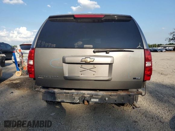 2007 Chevrolet Suburban LS with VIN 1GNFC16097J403193, listed as a Copart auction lot 51236075 with 191,350 mi miles and Salvage title. Bid and sale history available at DreamBid. Image 6.