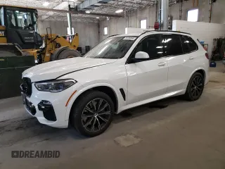 2020 BMW X5 M50i with VIN 5UXJU4C00L9C27198, listed as a Copart auction lot 76705264 with 0 mi miles and Salvage Title. Bid and sale history available at carsss.com. Image 1.