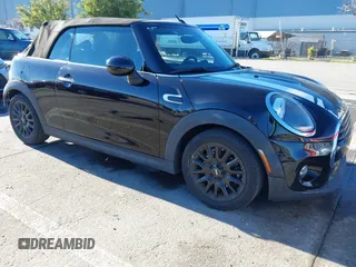 2019 MINI Convertible Cooper z VIN WMWWG5C59K3D01765, wystawiony jako IAAI lot #41381003 z przebiegiem 53 760 mil mil oraz . Historia ofert i sprzedaży dostępna na DreamBid. Obrazek 1.