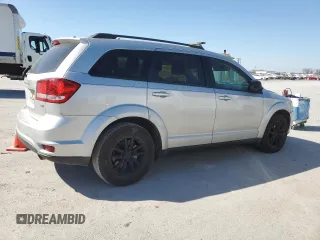 2014 Dodge Journey SXT with VIN 3C4PDCBB4ET124849, listed as a Copart auction lot 48590625 with 196,357 mi miles and Salvage Title. Bid and sale history available at DreamBid. Image 3.