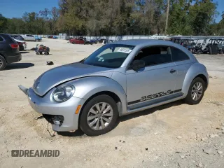 2013 Volkswagen Beetle Entry with VIN 3VWFP7AT9DM653613, listed as a Copart auction lot 48591595 with 121,307 mi miles and Salvage Title. Bid and sale history available at DreamBid. Image 1.