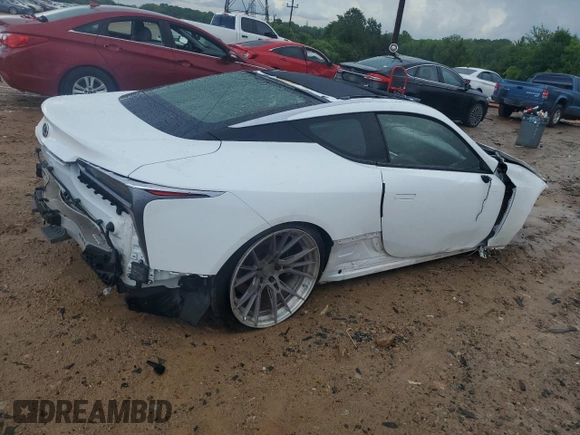 2018 Lexus LC 500h z VIN JTHHP5AY9JA000511, wystawiony jako Copart lot #56980995 z przebiegiem Nie podano mil oraz Szkody całkowita. Historia ofert i sprzedaży dostępna na DreamBid. Obrazek 3.