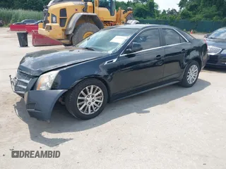 2011 Cadillac CTS Luxury with VIN 1G6DF5EY8B0100736, listed as a IAAI auction lot 42581059 with 107,237 mi miles and . Bid and sale history available at DreamBid. Image 2.
