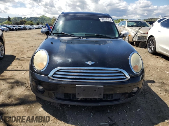2010 MINI Clubman z VIN WMWML3C59ATX37695, wystawiony jako Copart lot #50553525 z przebiegiem 122 247 mil mil oraz Szkoda całkowita • Salvage title. Historia ofert i sprzedaży dostępna na DreamBid. Obrazek 5.