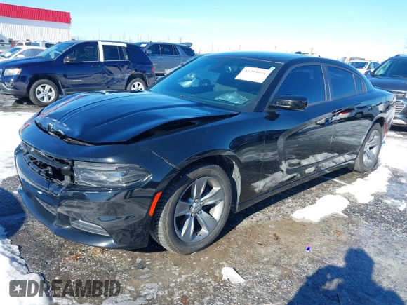 2015 Dodge Charger SXT with VIN 2C3CDXHG5FH841090, listed as a IAAI auction lot 41293591 with 107,732 mi miles and . Bid and sale history available at DreamBid. Image 2.