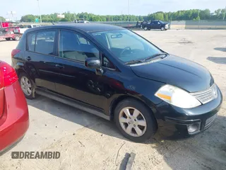 2007 Nissan Versa 1.8 S with VIN 3N1BC13E97L359537, listed as a IAAI auction lot 42127935 with 128,891 mi miles. Bid and sale history available at carsss.com. Image 1.