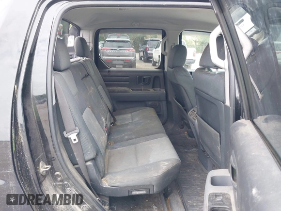 2007 Honda Ridgeline RTX z VIN 2HJYK16317H545839, wystawiony jako IAAI lot #42446190 z przebiegiem 183 600 mil mil oraz . Historia ofert i sprzedaży dostępna na DreamBid. Obrazek 8.