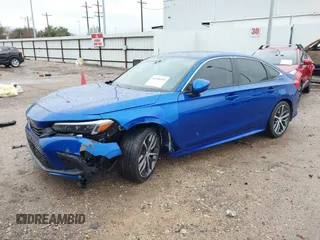 2023 Honda Civic Touring z VIN 2HGFE1F92PH317695, wystawiony jako IAAI lot #41556915 z przebiegiem 20 421 mil mil oraz . Historia ofert i sprzedaży dostępna na DreamBid. Obrazek 23.