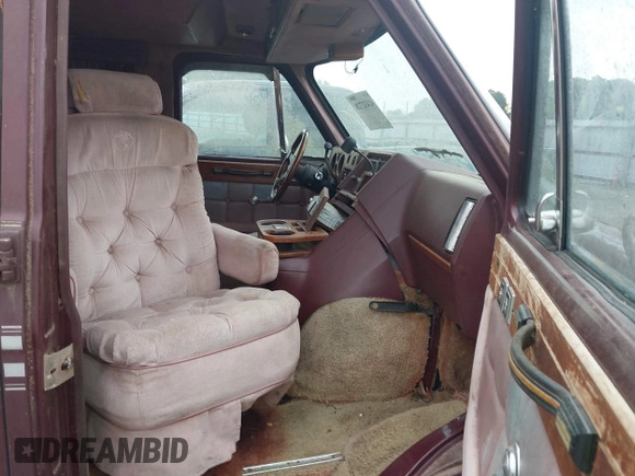 1989 Chevrolet Chevy Van z VIN 1GBEG25K5K7184695, wystawiony jako IAAI lot #42432728 z przebiegiem 945 928 mil mil oraz . Historia ofert i sprzedaży dostępna na DreamBid. Obrazek 5.