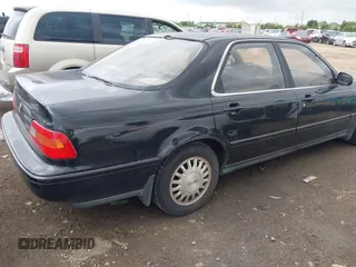 1993 Acura Legend L with VIN JH4KA7660PC010335, listed as a IAAI auction lot 42163696 with 75,309 mi miles and . Bid and sale history available at DreamBid. Image 4.
