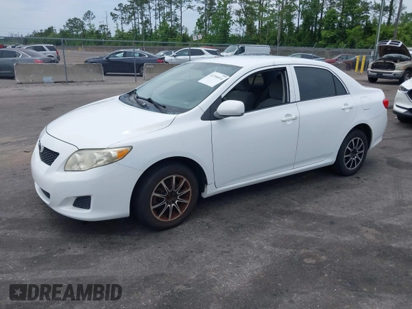 2009 Toyota Corolla with VIN 1NXBU40E09Z126070, listed as a IAAI auction lot 42196014 with 165,131 mi miles and . Bid and sale history available at DreamBid. Image 2.
