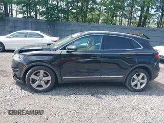 2017 Lincoln MKC Premiere with VIN 5LMCJ1C90HUL52132, listed as a IAAI auction lot 42611380 with 141,981 mi miles and . Bid and sale history available at DreamBid. Image 14.