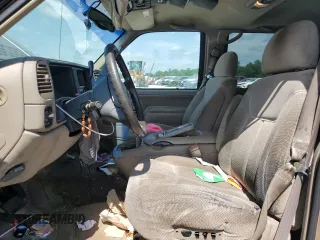 1999 Chevrolet Suburban with VIN 3GNEC16R6XG205408, listed as a Copart auction lot 57169415 with 303,412 mi miles and Salvage title. Bid and sale history available at DreamBid. Image 7.