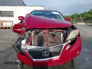 2011 Lexus RX 350 with VIN JTJZK1BA7B2004578, listed as a IAAI auction lot 42121086 with 161,990 mi miles and . Bid and sale history available at DreamBid. Image 12.