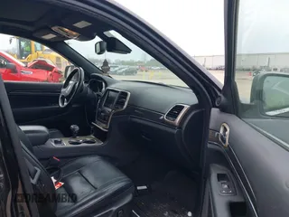 2014 Jeep Grand Cherokee Overland with VIN 1C4RJFCM8EC486259, listed as a IAAI auction lot 42105296 with 129,342 mi miles. Bid and sale history available at carsss.com. Image 5.