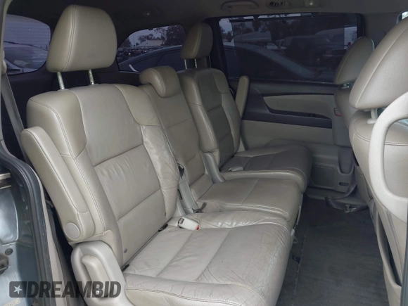 2012 Honda Odyssey EX-L with VIN 5FNRL5H66CB061847, listed as a IAAI auction lot 42162377 with 217,204 mi miles and . Bid and sale history available at DreamBid. Image 8.