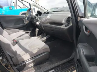2010 Honda Fit with VIN JHMGE8H21AC039375, listed as a IAAI auction lot 42126138 with 123,077 mi miles. Bid and sale history available at carsss.com. Image 5.