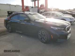 2024 BMW i5 M60 z VIN WBY43FK00RCP12947, wystawiony jako Copart lot #79117974 z przebiegiem Nie podano mil oraz Szkody całkowita. Historia ofert i sprzedaży dostępna na DreamBid. Obrazek 4.