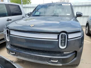 2023 Rivian R1S Adventure z VIN 7PDSGABA3PN018823, wystawiony jako Copart lot #53184595 z przebiegiem 36 677 mil mil oraz Szkoda całkowita • Salvage title. Historia ofert i sprzedaży dostępna na DreamBid. Obrazek 5.