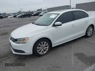 2014 Volkswagen Jetta Sedan SE w/Connectivity/Sunroof PZEV with VIN 3VWD17AJ6EM420961, listed as a IAAI auction lot 42107575 with 198,329 mi miles. Bid and sale history available at carsss.com. Image 2.