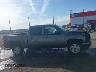 2011 Chevrolet Silverado 1500 LTZ with VIN 3GCPKTE39BG212827, listed as a IAAI auction lot 41044871 with 197,096 mi miles and . Bid and sale history available at DreamBid. Image 13.