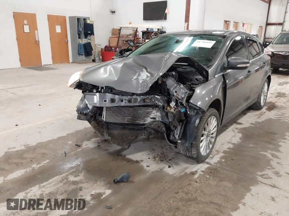 2012 Ford Focus Titanium with VIN 1FAHP3N27CL313288, listed as a IAAI auction lot 41741895 with 140,376 mi miles and . Bid and sale history available at carsss.com. Image 6.
