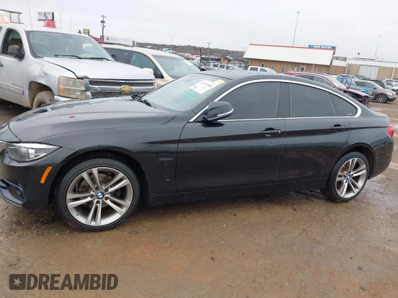 2019 BMW 4 Series 430i xDrive with VIN WBA4J3C53KBL08291, listed as a IAAI auction lot 41471858 with 63,933 mi miles. Bid and sale history available at carsss.com. Image 14.