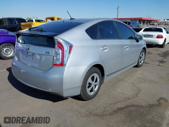 2013 Toyota Prius One with VIN JTDKN3DU1D5650005, listed as a IAAI auction lot 42040252 with 88,286 mi miles. Bid and sale history available at carsss.com. Image 4.