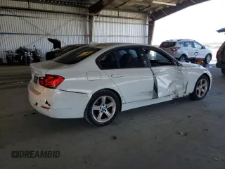 2013 BMW 3 Series 328i with VIN WBA3C1G56DNR44970, listed as a Copart auction lot 62781465 with 96,935 mi miles and Salvage title. Bid and sale history available at DreamBid. Image 3.