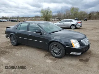 2007 Cadillac DTS Performance with VIN 1G6KD57937U201301, listed as a Copart auction lot 52868565 with 119,972 mi miles and Salvage Title. Bid and sale history available at carsss.com. Image 4.