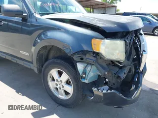 2008 Ford Escape XLS z VIN 1FMCU02Z28KD32661, wystawiony jako IAAI lot #42316426 z przebiegiem 184 552 mil mil oraz . Historia ofert i sprzedaży dostępna na DreamBid. Obrazek 22.