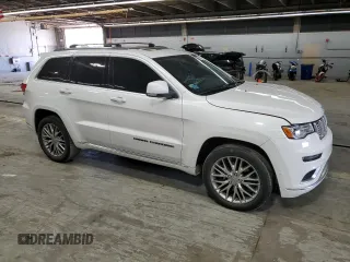 2018 Jeep Grand Cherokee Summit with VIN 1C4RJFJT5JC273869, listed as a Copart auction lot 57482865 with 70,843 mi miles and Salvage title. Bid and sale history available at DreamBid. Image 4.