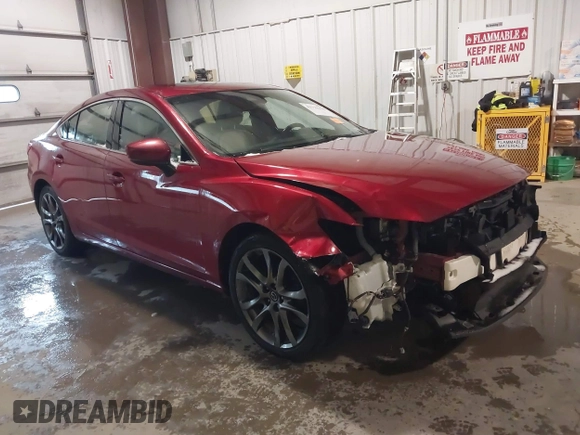 2017 Mazda 6 Grand Touring with VIN JM1GL1X57H1135401, listed as a IAAI auction lot 41722330 with 100,869 mi miles. Bid and sale history available at carsss.com. Image 1.