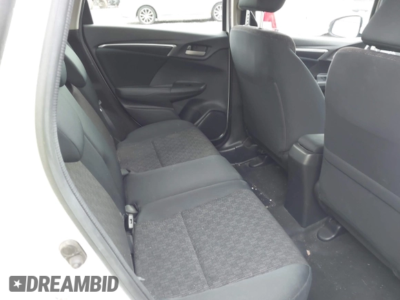 2017 Honda Fit LX with VIN JHMGK5H58HS021117, listed as a IAAI auction lot 42026243 with 94,953 mi miles. Bid and sale history available at carsss.com. Image 8.