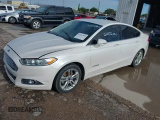 2016 Ford Fusion SE Hybrid z VIN 3FA6P0LU2GR202472, wystawiony jako IAAI lot #42637403 z przebiegiem Nie podano mil oraz . Historia ofert i sprzedaży dostępna na DreamBid. Obrazek 2.