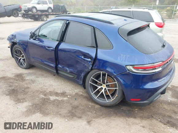 2023 Porsche Macan with VIN WP1AA2A5XPLB06079, listed as a IAAI auction lot 41399589 with 4,287 mi miles. Bid and sale history available at carsss.com. Image 3.