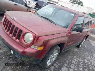 2013 Jeep Patriot Latitude with VIN 1C4NJPFA3DD237804, listed as a IAAI auction lot 41876591 with 73,852 mi miles. Bid and sale history available at carsss.com. Image 2.