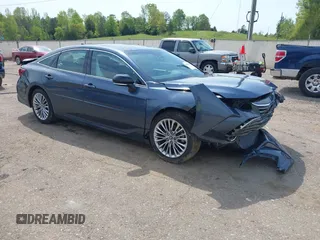 2019 Toyota Avalon XLE z VIN 4T1BZ1FB0KU030278, wystawiony jako IAAI lot #41984852 z przebiegiem 127 165 mil mil oraz . Historia ofert i sprzedaży dostępna na DreamBid. Obrazek 1.