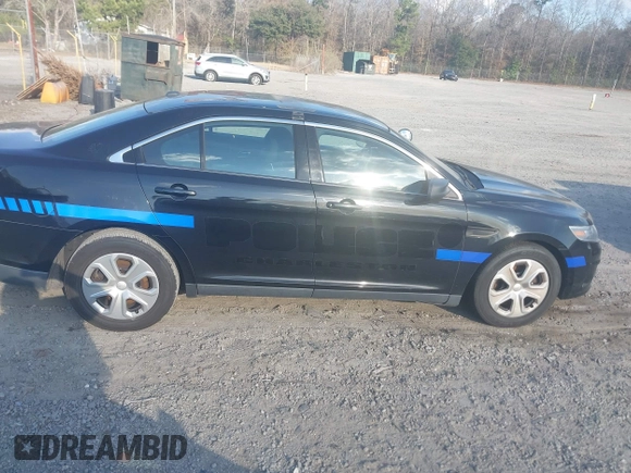 2015 Ford Police Interceptor with VIN 1FAHP2L85FG154091, listed as a IAAI auction lot 41540659 with 104,234 mi miles and . Bid and sale history available at DreamBid. Image 13.