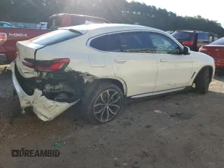 2020 BMW X4 xDrive30i with VIN 5UX2V1C05L9B34564, listed as a Copart auction lot 70014203 with 0 mi miles. Bid and sale history available at carsss.com. Image 3.