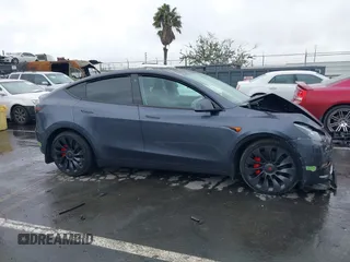 2023 Tesla Model Y Performance with VIN 7SAYGDEF0PF774282, listed as a IAAI auction lot 41807031 with Not Provided miles and . Bid and sale history available at DreamBid. Image 12.